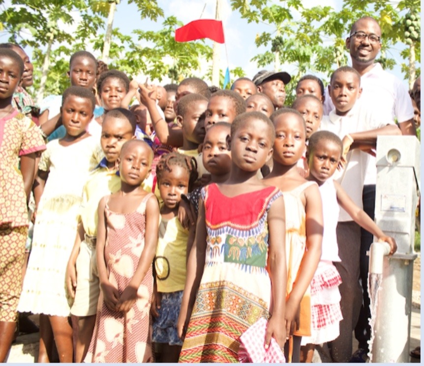 Dr. Sangu Delle with community